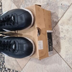 Nike Black and White Sneakers with Leather-like Upper. CORTEZ BASIC LEATHER '06